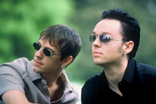 Two men sunglasses looking distance free wallpaper for desktop - medium preview image