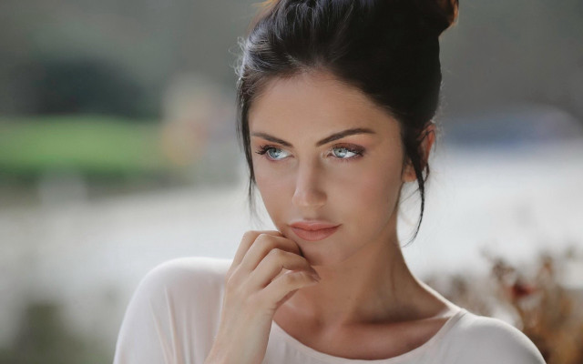 Woman bun white shirt blue free wallpaper for desktop - medium preview image