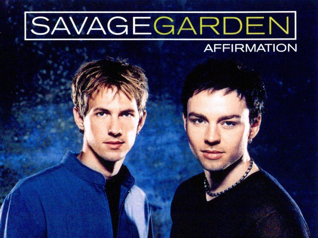 Two men standing blue background free wallpaper for desktop - medium preview image