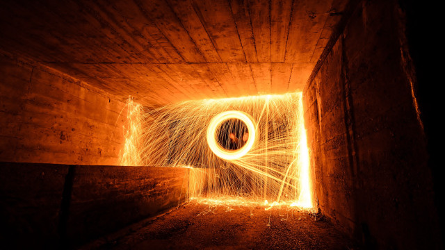 Tunnel circular light sparks person free wallpaper for desktop - medium preview image