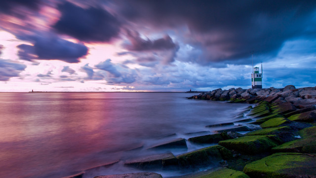 Lighthouse rocky shore mystical sky free wallpaper for desktop - medium preview image