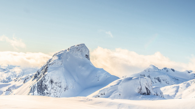 Snowy mountain sky clouds snowboard free wallpaper for desktop - medium preview image