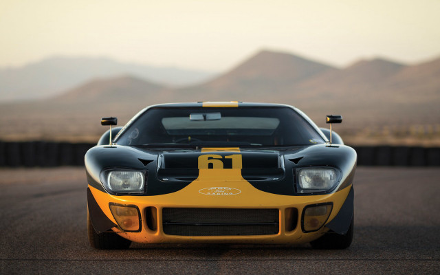 Yellow black sports car mountains free wallpaper for desktop - medium preview image