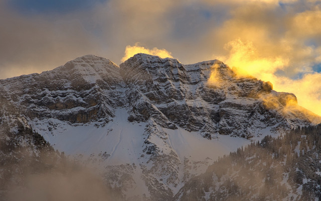 Snowy mountain cloudy sky volumetric free wallpaper for desktop - medium preview image