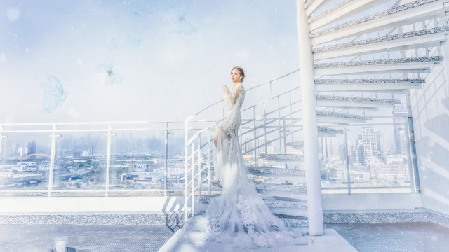 Woman white dress balcony cityscape #2 free wallpaper for desktop - medium preview image