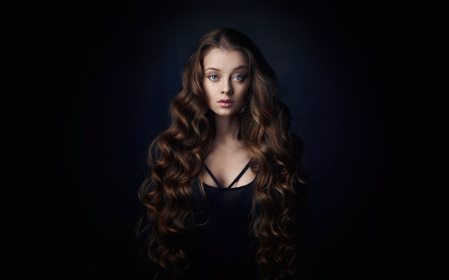 Woman curly long hair blue free wallpaper for desktop - medium preview image