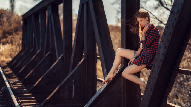 Woman leaning bridge cellphone autumn free wallpaper for desktop - medium preview image