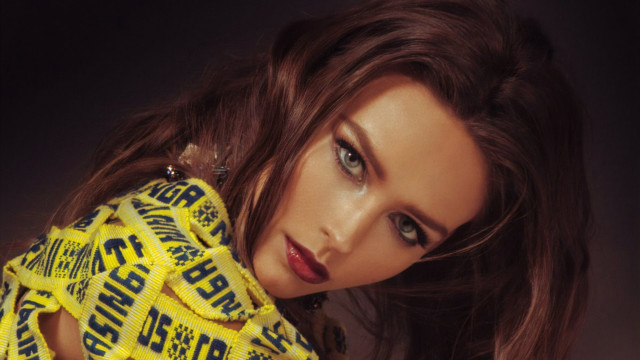 Woman long hair yellow shirt #2 free wallpaper for desktop - medium preview image