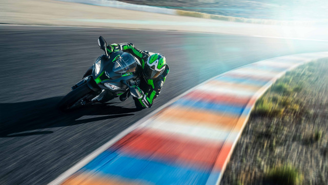Motorcycle race track helmet green free wallpaper for desktop - medium preview image