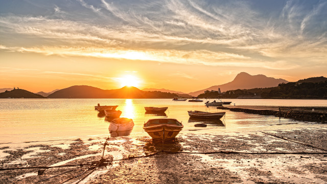 Sunset boats water beach lighthouse free wallpaper for desktop - medium preview image