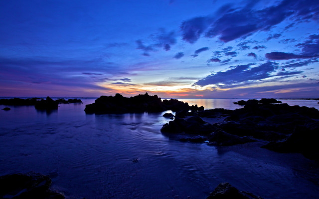 Sunset water rocks clouds beach free wallpaper for desktop - medium preview image