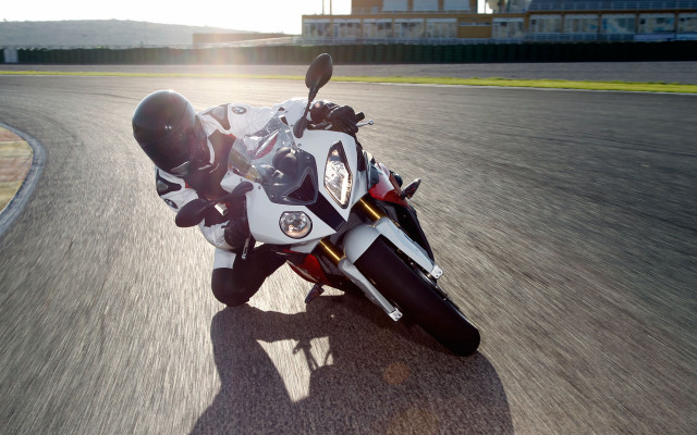 Motorcycle road building fence grass free wallpaper for desktop - medium preview image