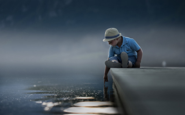 Man sitting ledge hat reflective free wallpaper for desktop - medium preview image
