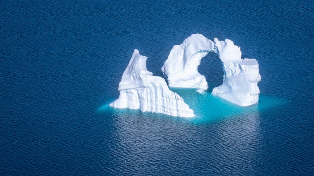 Iceberg ocean boat ecological puzzle free wallpaper for desktop - medium preview image