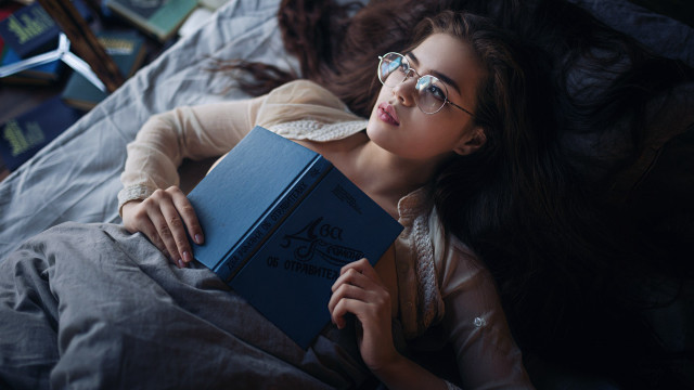 Woman lying reading book ankazhuravleva free wallpaper for desktop - medium preview image