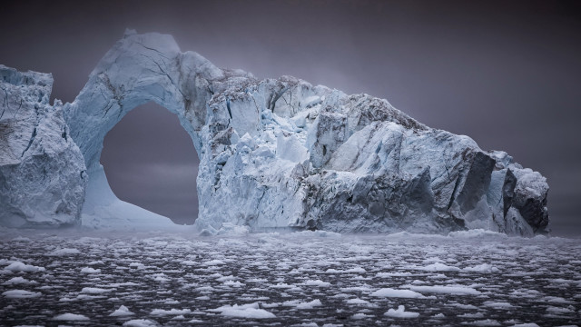 Large iceberg arch ocean environmental free wallpaper for desktop - medium preview image