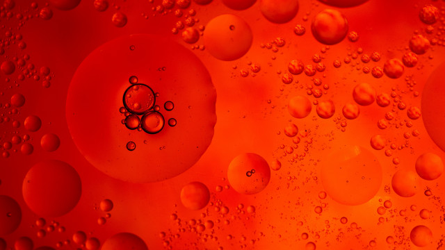 Red liquid bubbles macro oil free wallpaper for desktop - medium preview image