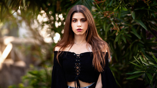 Woman black top tie portrait free wallpaper for desktop - medium preview image