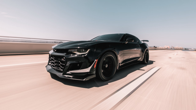 Black chevrolet camaro highway sun free wallpaper for desktop - medium preview image