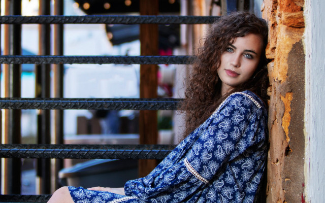 Woman ledge wall window fence free wallpaper for desktop - medium preview image