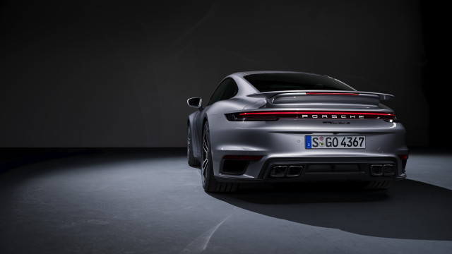 Silver porsche 9117 dark room free wallpaper for desktop - medium preview image