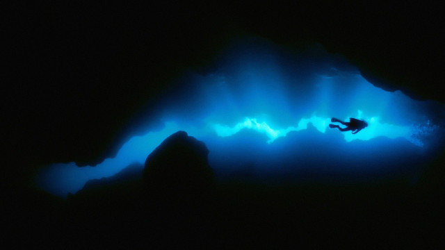 Swimming cave blue light man free wallpaper for desktop - medium preview image