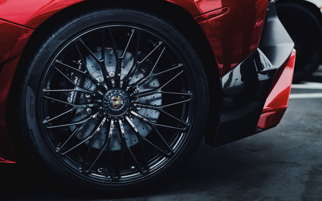 Red sports car black rim free wallpaper for desktop - medium preview image