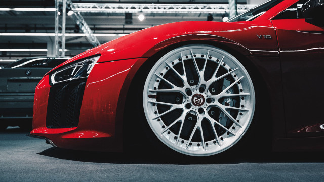 Red sports car garage rimlights free wallpaper for desktop - medium preview image