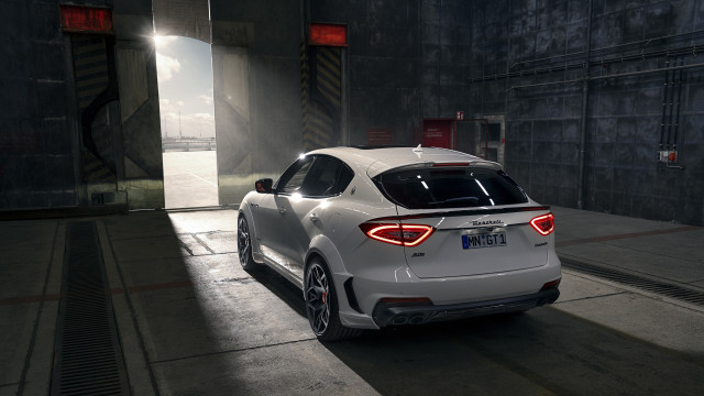 White car parking garage building #2 free wallpaper for desktop - medium preview image