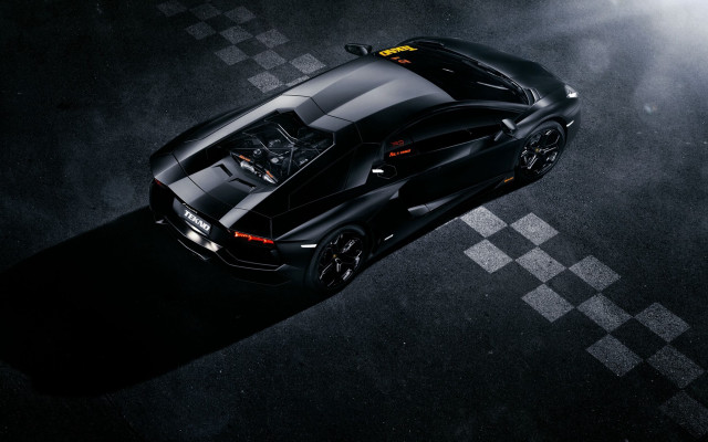 Black sports car checkered argyle free wallpaper for desktop - medium preview image