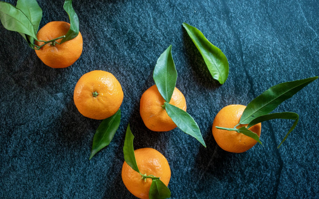 Oranges leaves blue surface constellation free wallpaper for desktop - medium preview image