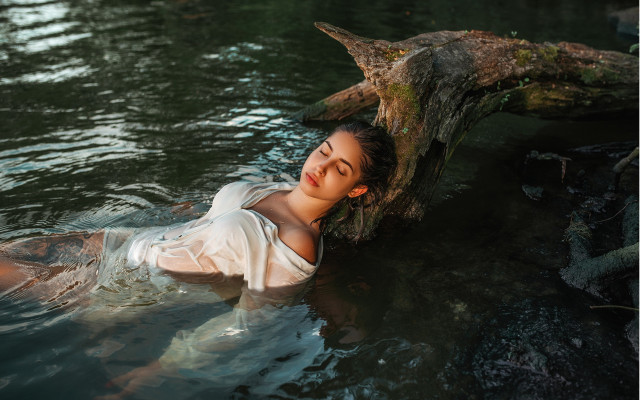 Floating woman tree log water free wallpaper for desktop - medium preview image