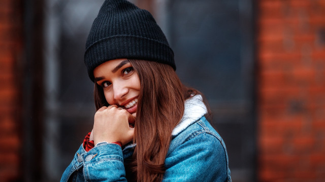 Woman denim jacket beanie smiles free wallpaper for desktop - medium preview image