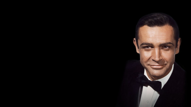 Man tuxedo bowtie smiling camera free wallpaper for desktop - medium preview image