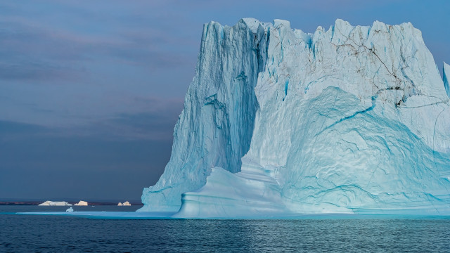 Large iceberg ocean sky clouds free wallpaper for desktop - medium preview image