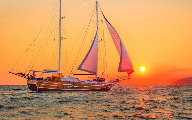 Sailboat sunset ocean sky sails free wallpaper for desktop - medium preview image