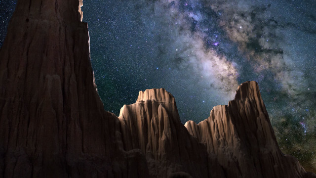 Night sky stars mountain rock free wallpaper for desktop - medium preview image