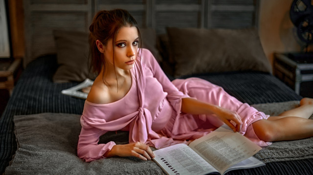 Woman pink dress bed reading free wallpaper for desktop - medium preview image