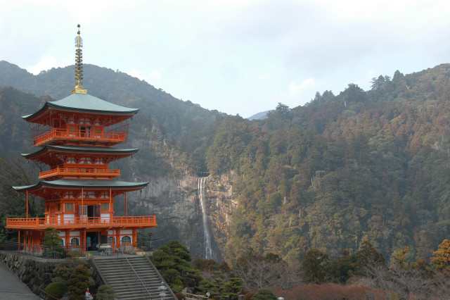 Tall pagoda steeple mountainside waterfall free wallpaper for desktop - medium preview image