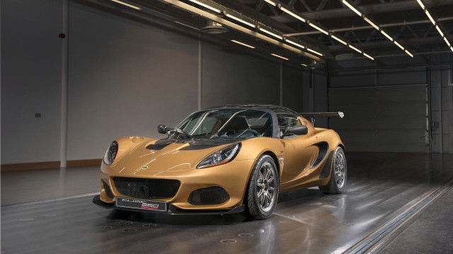 Gold sports car garage roof free wallpaper for desktop - medium preview image