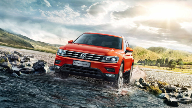 Red volkswagen suv river rocks free wallpaper for desktop - medium preview image