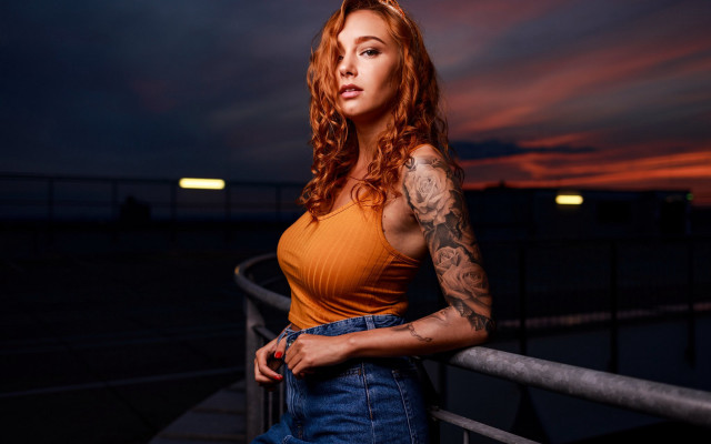 Tattooed woman balcony night sunset free wallpaper for desktop - medium preview image