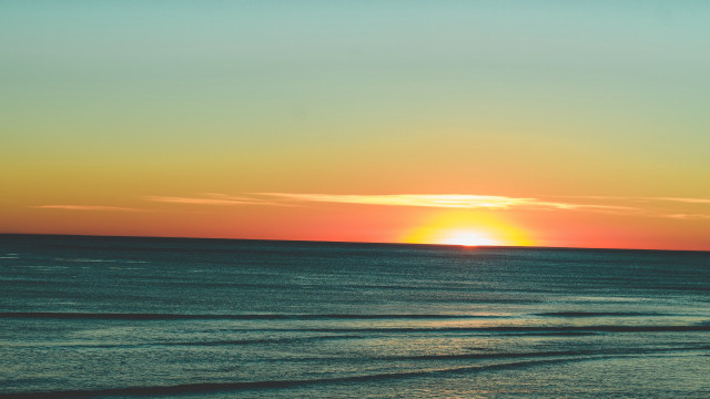 Sunset ocean surfer boat cloud free wallpaper for desktop - medium preview image