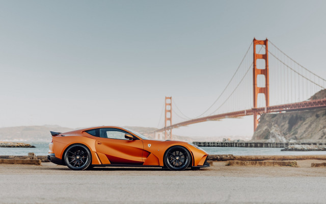 Orange sports car bridge water free wallpaper for desktop - medium preview image