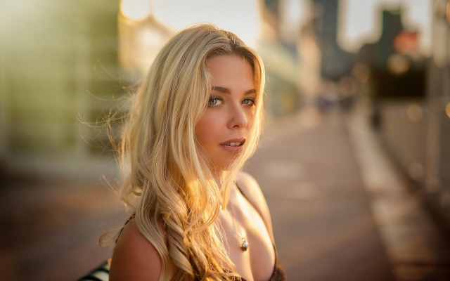 Blonde woman sidewalk building portrait free wallpaper for desktop - medium preview image