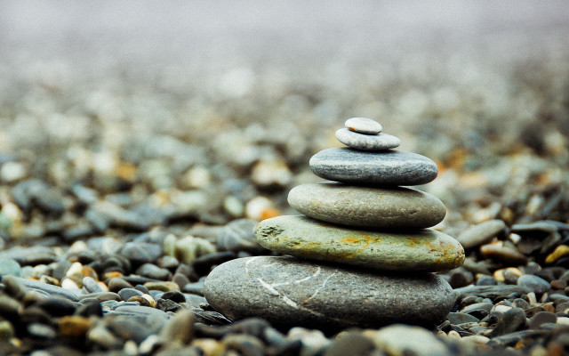 Stacked rocks gravel bokeh symmetric free wallpaper for desktop - medium preview image