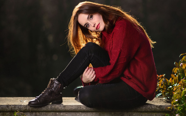 Woman sitting ledge red sweater free wallpaper for desktop - medium preview image