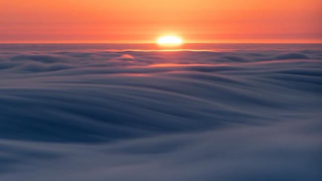 Sunset ocean waves horizon fog free wallpaper for desktop - medium preview image