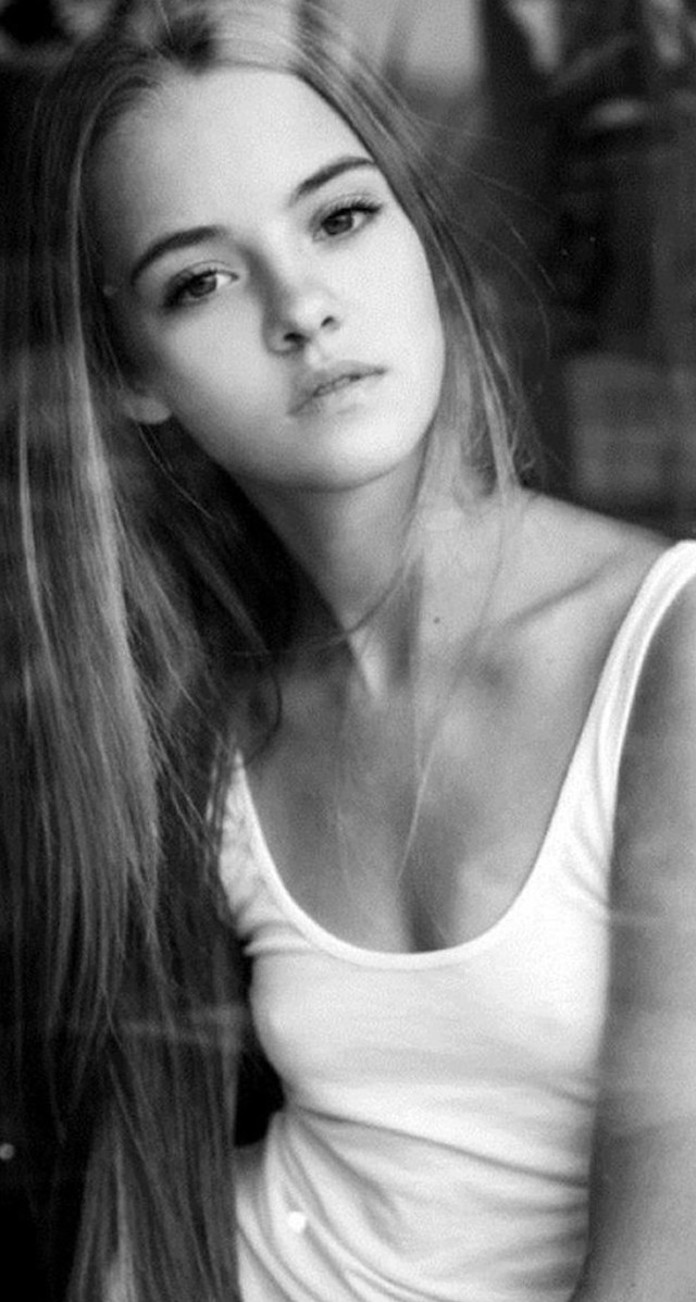 Woman longhair sitting chair blackandwhite free wallpaper for mobile - medium preview image