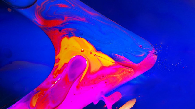Blue yellow liquid pouring fire free wallpaper for desktop - medium preview image